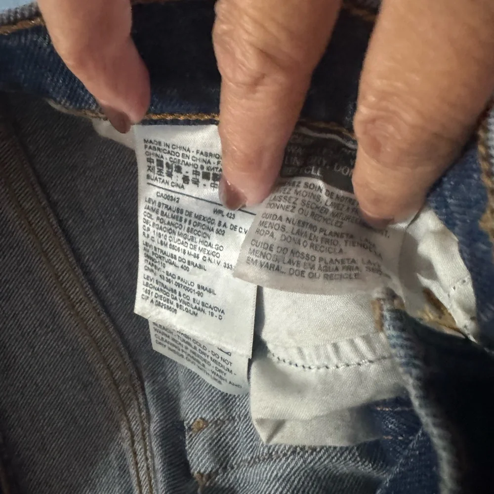 Upcycled Grommet design button fly Levi’s size 28